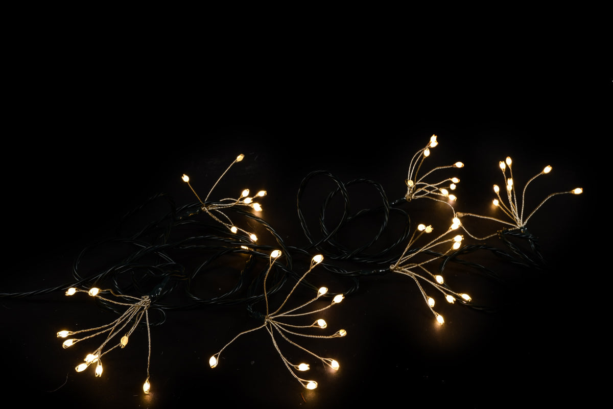 Cluster Ciuffi 100 Luci LED con Flash Bianco Caldo